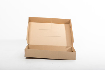 Opened flat cardboard box with sticky tape