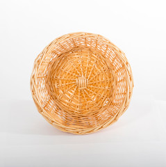 Fototapeta premium Empty yellow wicker basket top view