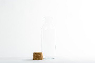 Empty glass bottle with cork