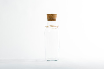 Empty glass bottle with cork
