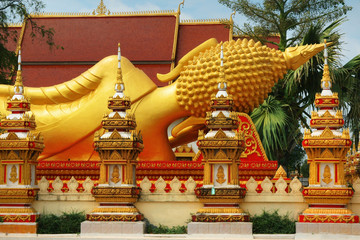 sleeping buddha statue at Pha That Luang temple in Vientiane , Laos