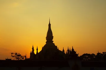 Fotobehang shape of Pha That Luang temple during sunset, in Vientiane , Laos © MICHEL