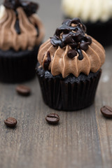 Tasty mini cupcakes on a vintage background, sweet dessert for christmas, new year and valentine holliday