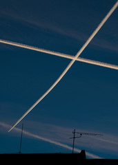 Crossing plane's trails over the sky