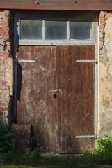 Abandoned house with door.