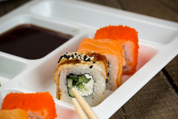 Sushi, rolls, are a traditional dish of the cuisine of the land of the rising sun.