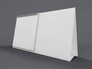 Empty desk calendar on table. Mockup design concept. 3D