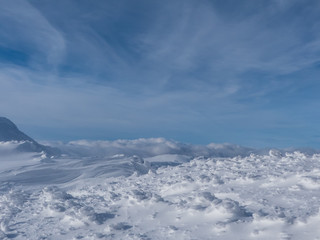 Fototapeta na wymiar View of the snowy peaks and slopes of the mountains Low Tatras, Slovakia.