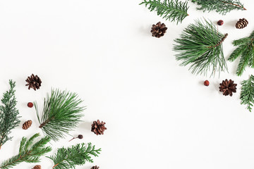 Naklejka na ściany i meble Christmas composition. Coniferous tree branches on white background. Christmas, winter, new year concept. Flat lay, top view, copy space