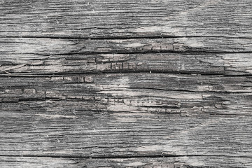 Texture of very old decayed wooden boards with natural pattern, abstract grunge retro background,

