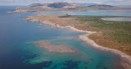 Drone footage, a beautiful day. Panoramas of the coasts of Sardinia, Italy. Stintino, La Pelosa and Asinara.