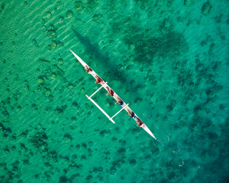 Aerial shot of Outrigger canoe in Micronesia