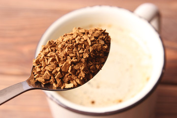  Put instant coffee in a cup. Flavored coffee