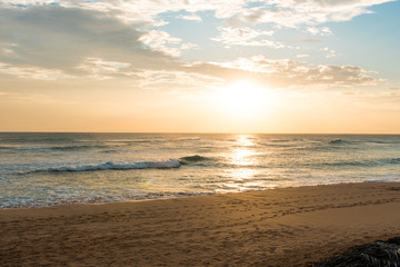 Fototapeta na wymiar sunset on the coast of the Indian Ocean