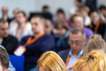 Obraz premium People attend business conference in the congress hall
