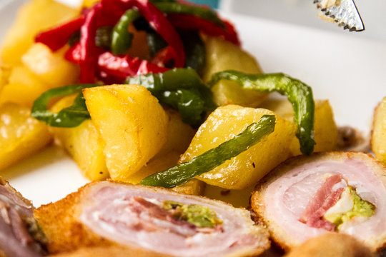 Comida casera con flamenquin