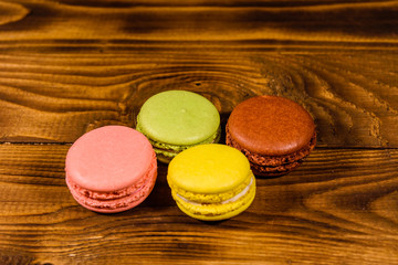 French macaroons on wooden table