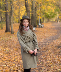 Fototapeta na wymiar autumn portrait in the park