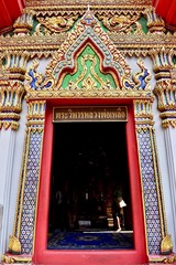 Door into temple in Bangkok, Thailand. 