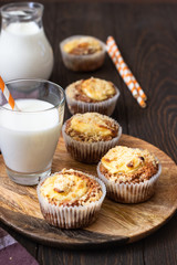 Fresh homemade muffins with cream cheese filling and streusel.