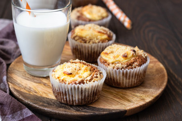 Fresh homemade muffins with cream cheese filling and streusel.