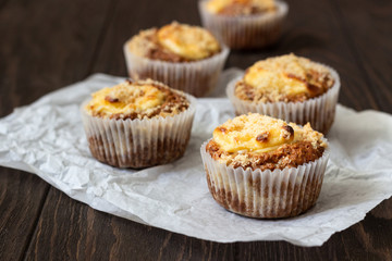 Fresh homemade muffins with cream cheese filling and streusel.
