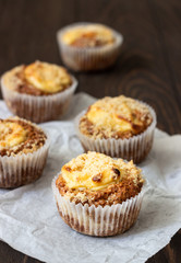 Fresh homemade muffins with cream cheese filling and streusel.