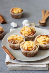 Fresh homemade muffins with cream cheese filling and streusel.