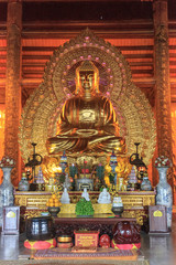 Fototapeta na wymiar inside of a golden buddhist temple, vietnam