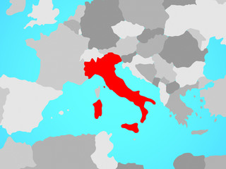 Italy on blue political globe.
