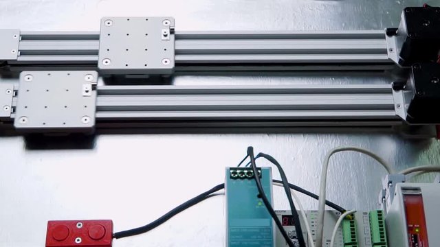 demonstration stand showing the possibilities of modern electronics. Series of servomotors connected with a microcontroller for automatic control of a robotic platform.