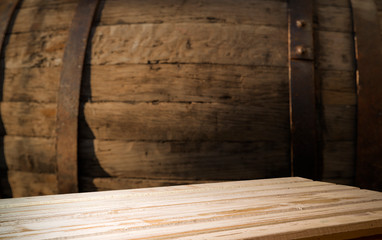 background of barrel and worn old table of wood