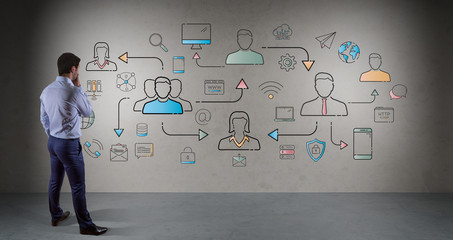 Businessman watching thin line social network icons interface