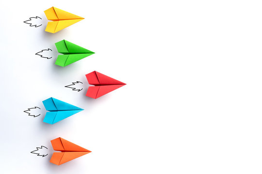 Paper planes on white background. Business competition concept.