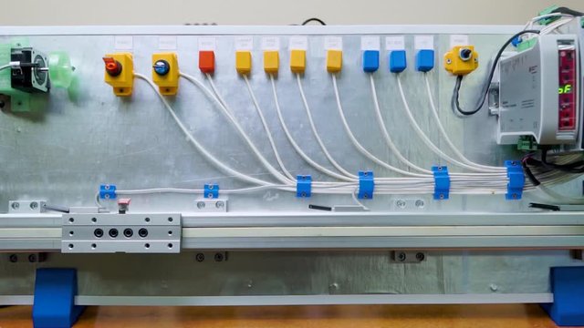 demonstration stand showing the possibilities of modern electronics. Series of servomotors connected with a microcontroller for automatic control of a robotic platform.