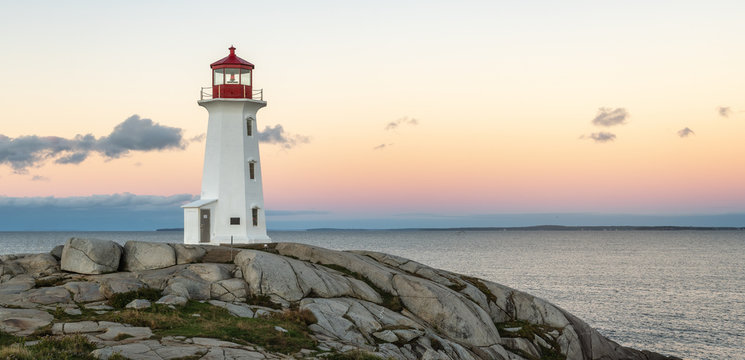 Peggys Cove Lighthouse with yellow sky