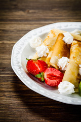 Crepes with fruit and creme
