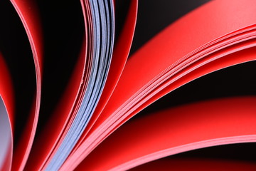 Closeup of opened magazine pages focused on edges