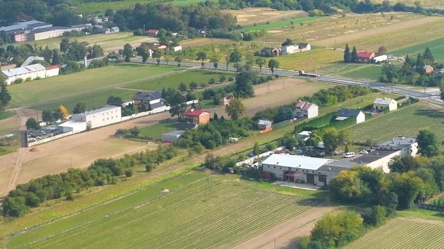 Nowy Dwor, Poland aerial view from window on airplane flying above airport, rural landscape, countryside near Warsaw