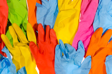 Background of multi-colored latex gloves.