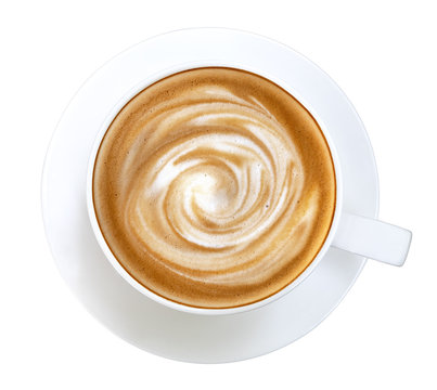 Hot coffee latte cappuccino spiral foam in ceramic cup top view isolated on white background, clipping path included