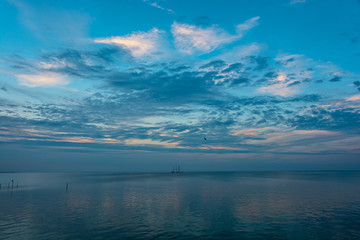 sea, blue sky and sailing ship