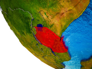 Tanzania on model of Earth with country borders and blue oceans with waves.