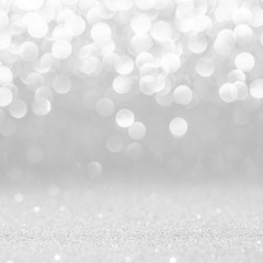 silver and white bokeh lights abstract background