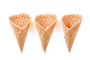 Empty wafer cone cups for ice cream isolated on white background