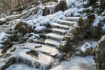 Fototapeta na wymiar Vereiste Treppe am Uracher Wasserfall