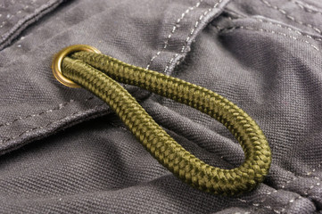 clothing items washed cotton fabric texture with seams, clasps, buttons and rivets