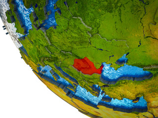Romania on model of Earth with country borders and blue oceans with waves.