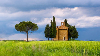 Fototapeta na wymiar tuscan chapel with trees