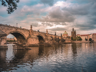 Charles bridge in Prague wiht cloudy sky